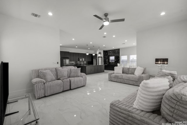 living room with ceiling fan