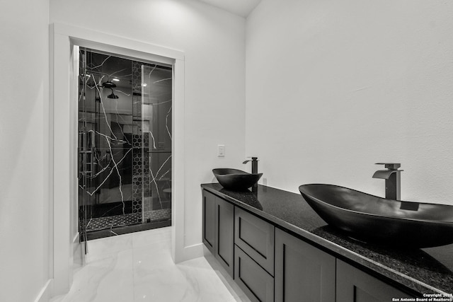 bathroom with vanity and walk in shower