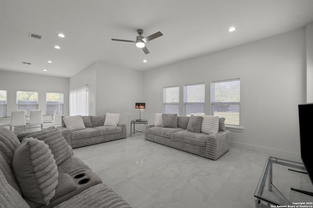 living room featuring ceiling fan