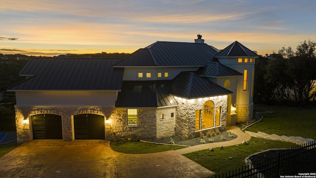 view of front of property with a garage