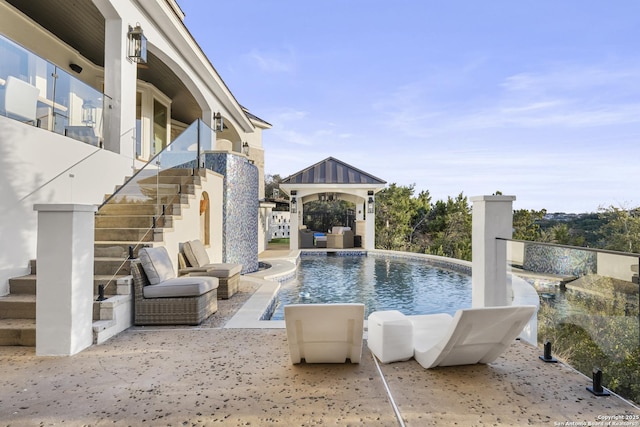 view of pool with a gazebo and a patio area