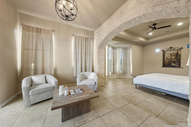 bedroom with a tray ceiling