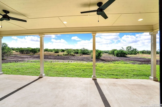 view of patio / terrace with a rural view and ceiling fan