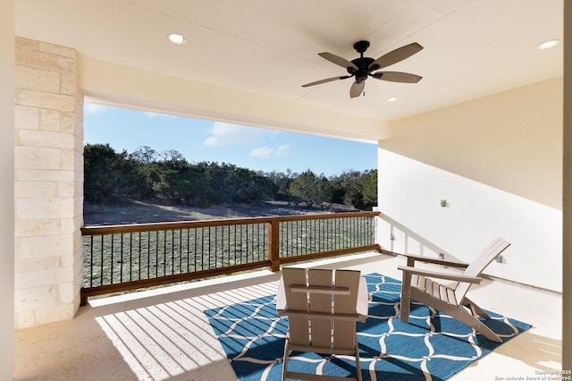 wooden deck with ceiling fan