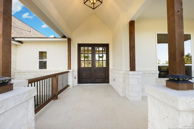 property entrance featuring french doors