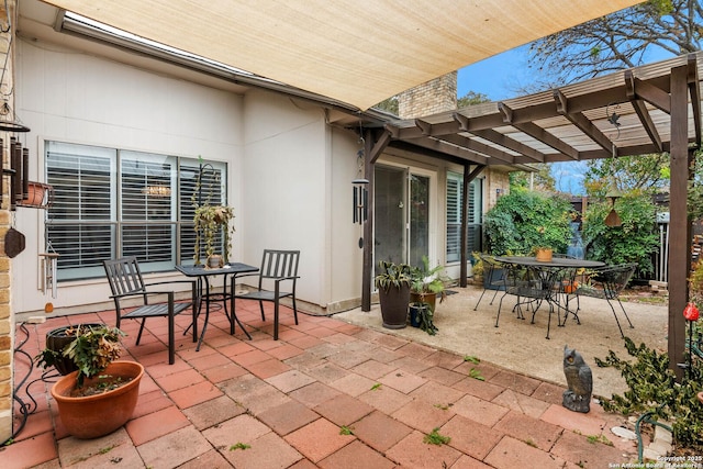 view of patio featuring a pergola