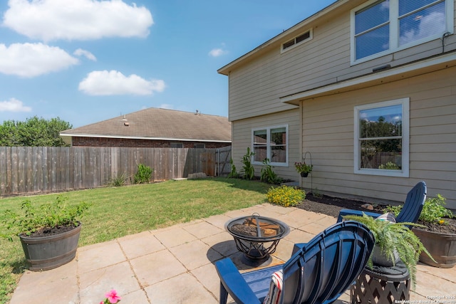 view of patio / terrace featuring a fire pit