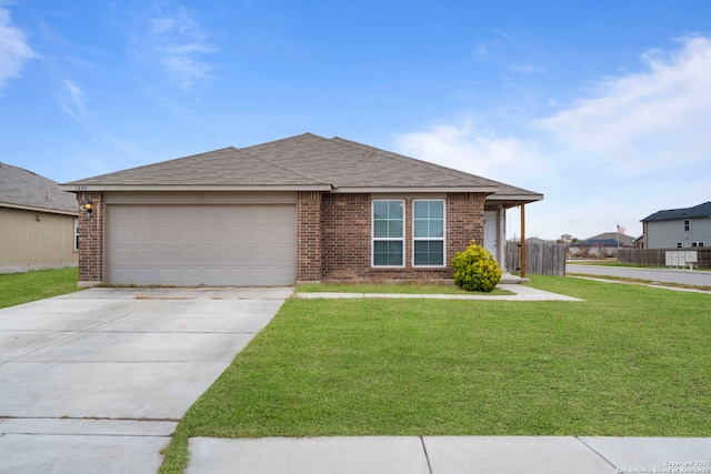 ranch-style house with a garage and a front lawn