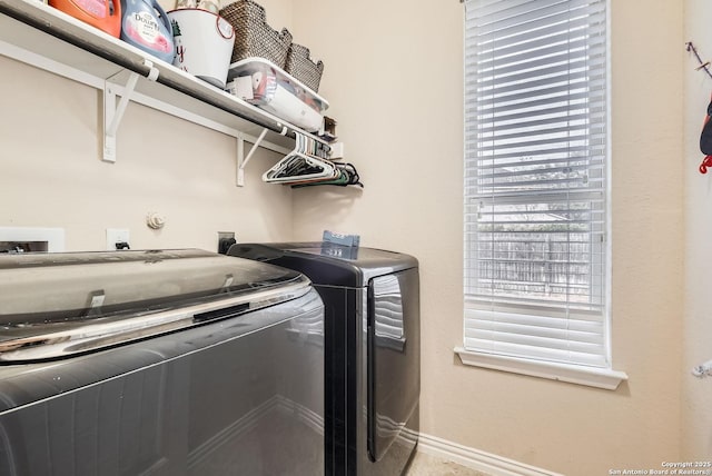 laundry area with washer and dryer