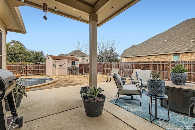 view of patio with a shed, a swimming pool, and area for grilling