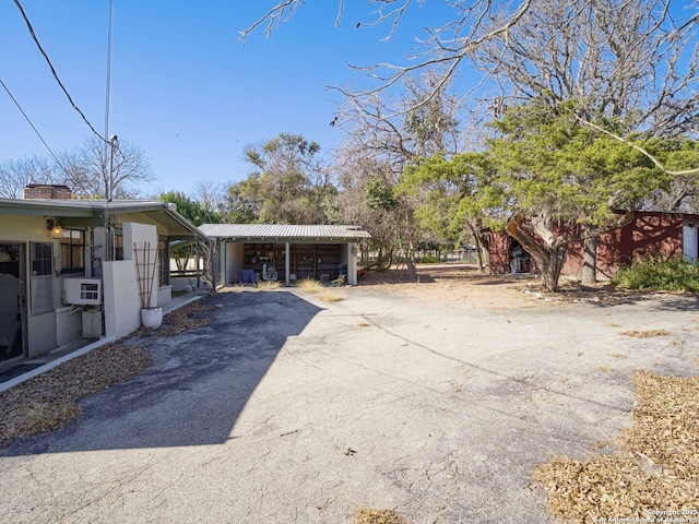 exterior space featuring an outbuilding