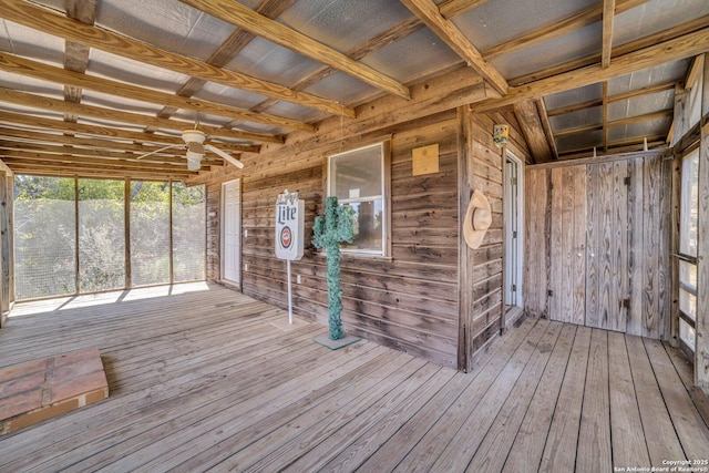 wooden terrace featuring ceiling fan