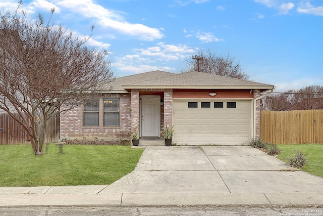 view of front facade featuring a garage and a front lawn