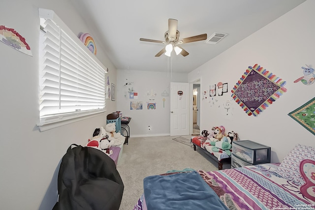 carpeted bedroom featuring ceiling fan