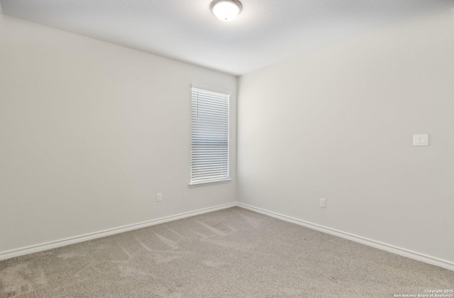 spare room with carpet flooring