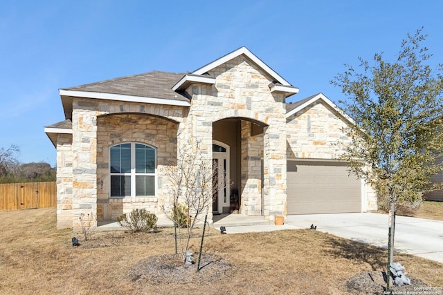 view of front of home with a garage