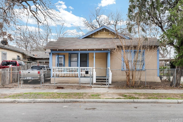 bungalow-style home with a porch