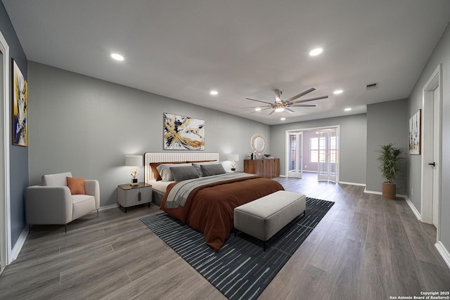 bedroom with ceiling fan and hardwood / wood-style floors