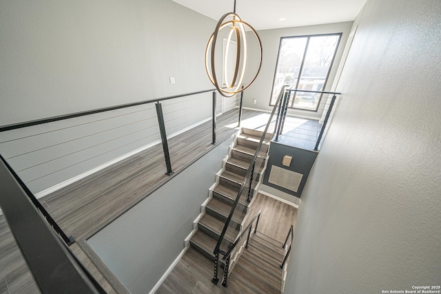 stairway with wood-type flooring