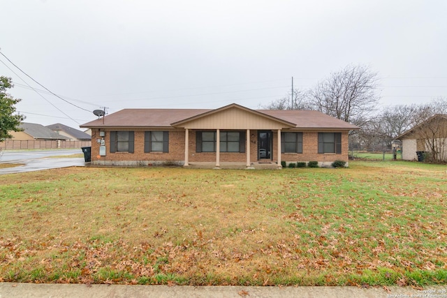 ranch-style house with a front lawn