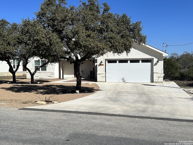 view of front of property with a garage