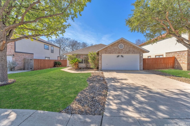 view of front of property featuring a garage and a front yard