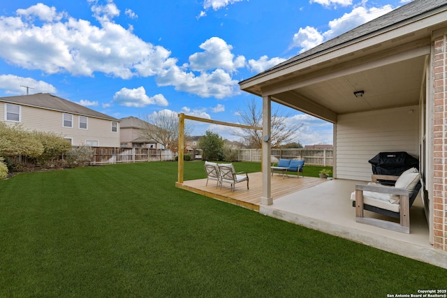 view of yard featuring a deck