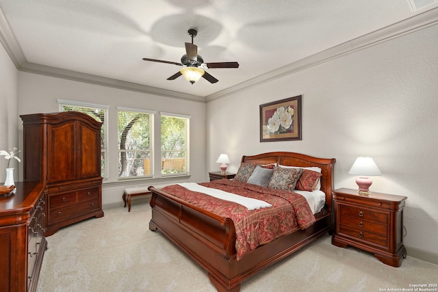 bedroom featuring light carpet, crown molding, baseboards, and ceiling fan