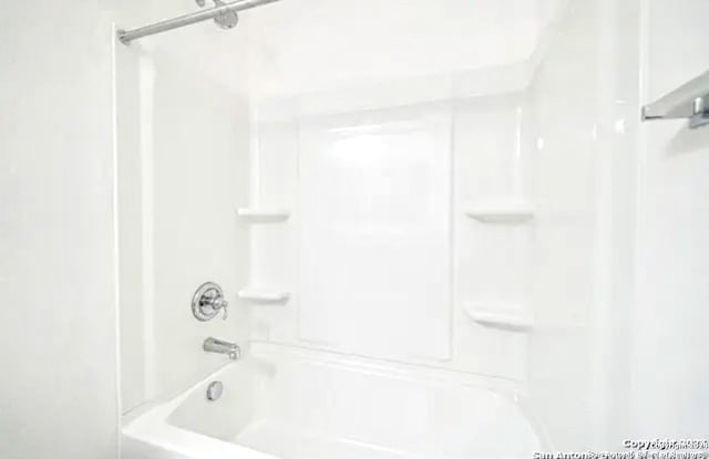 bathroom featuring shower / bath combination