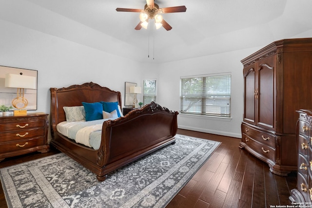 bedroom featuring ceiling fan and dark hardwood / wood-style flooring