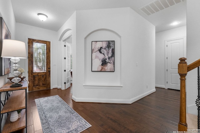 entrance foyer with dark wood-type flooring