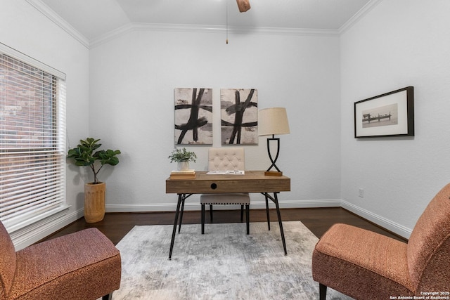 home office featuring ornamental molding, lofted ceiling, dark wood-type flooring, and ceiling fan