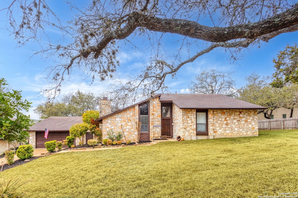 view of front of house with a front lawn