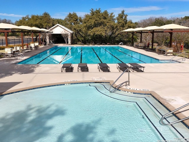 view of pool with a gazebo and a patio area