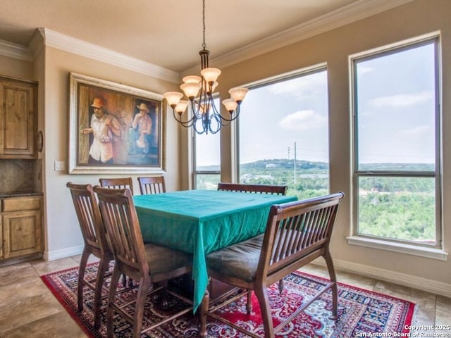 dining area with crown molding, light tile patterned flooring, and a chandelier