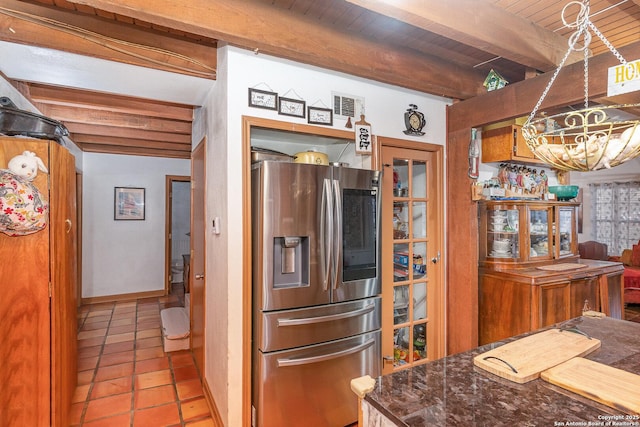 kitchen with wood ceiling, beam ceiling, stainless steel fridge with ice dispenser, and light tile patterned floors