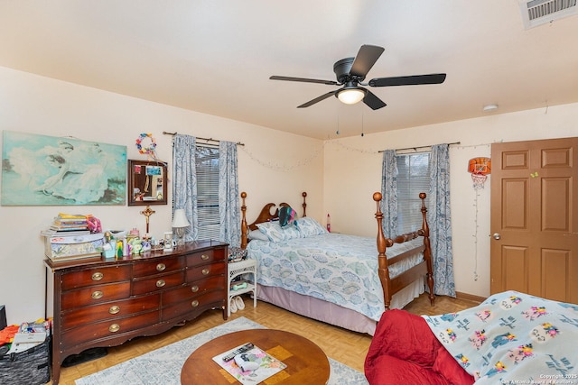 bedroom featuring light parquet flooring and ceiling fan