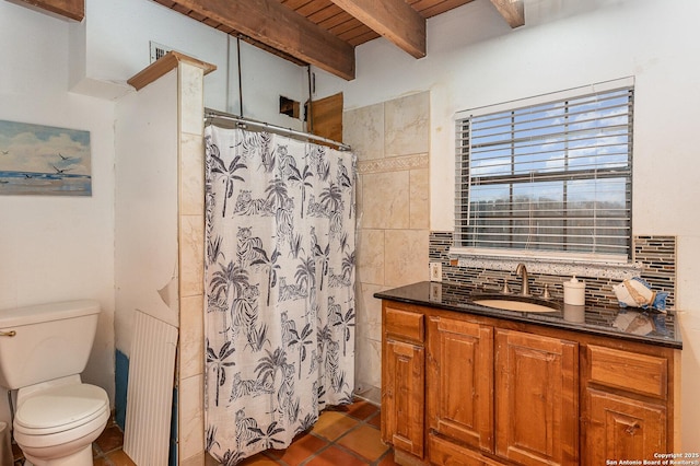 bathroom with curtained shower, beamed ceiling, decorative backsplash, vanity, and toilet