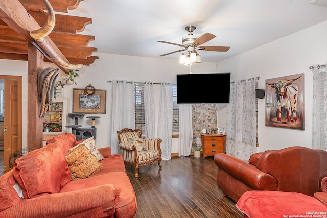 living room featuring dark hardwood / wood-style floors and ceiling fan