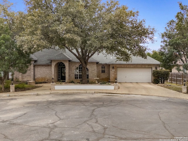 view of front of property featuring a garage