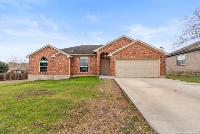 single story home with a garage and a front lawn