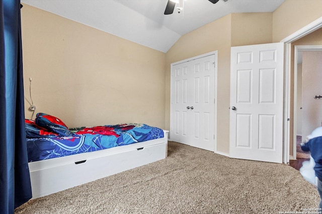 carpeted bedroom with lofted ceiling and ceiling fan