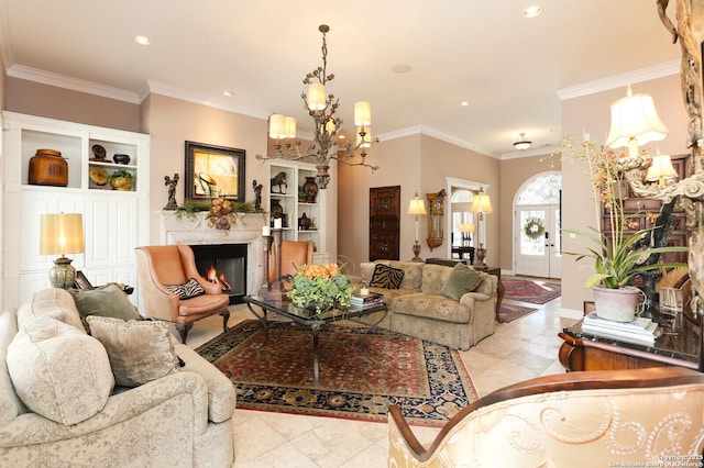 living room with a high end fireplace, ornamental molding, and a chandelier