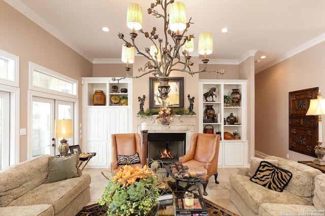 living room featuring ornamental molding, built in features, and french doors