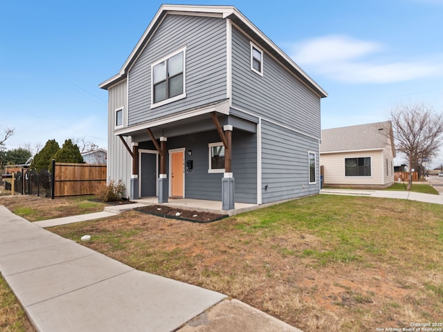 view of front of house with a porch and a front lawn