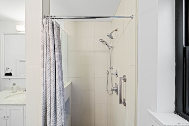 bathroom with vanity and a shower with curtain