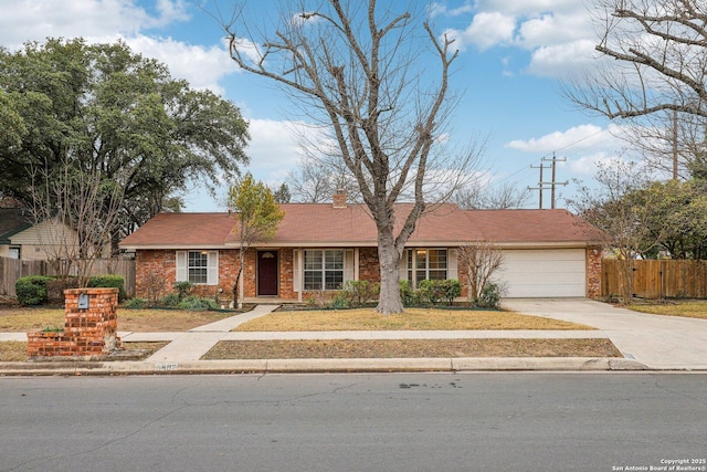 ranch-style home with a garage