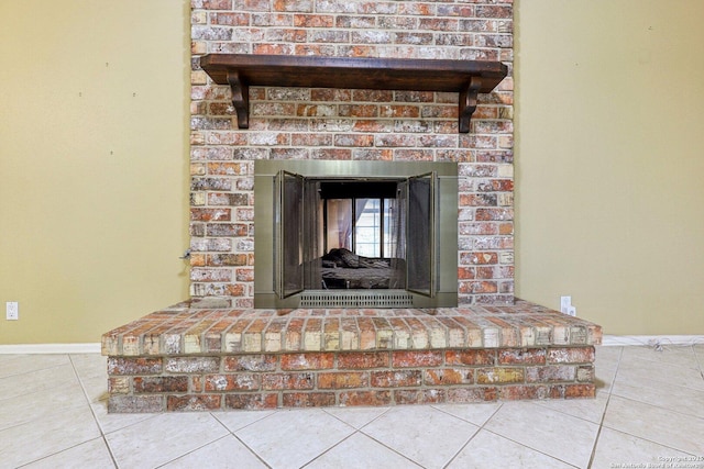 details featuring a brick fireplace