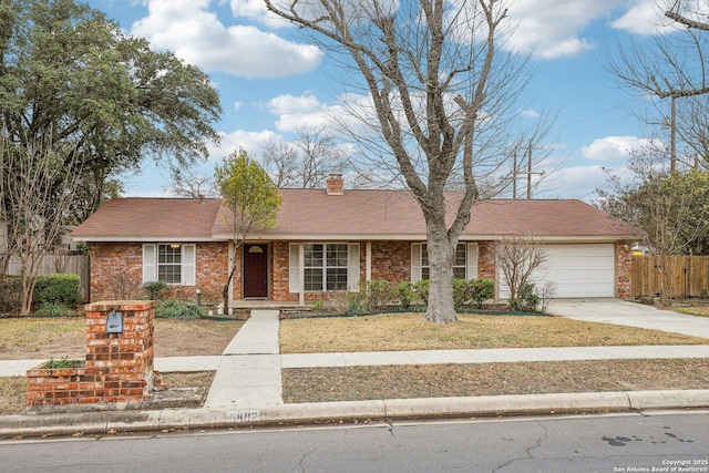 single story home with a garage