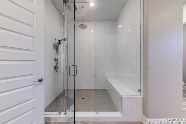 bathroom featuring walk in shower